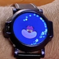 Jestergrin — Cheshire Cat Watchable with Collector Backpack — Limited Edition 1-of-1